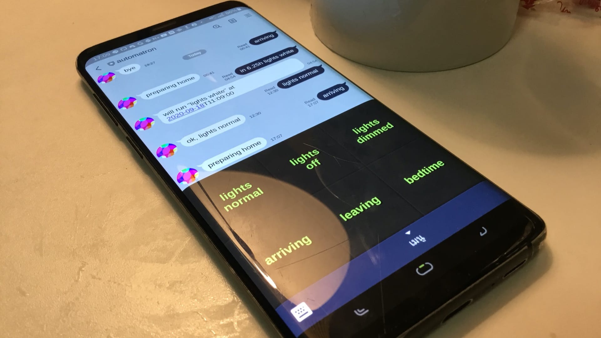 Photo of my phone with chat logs
